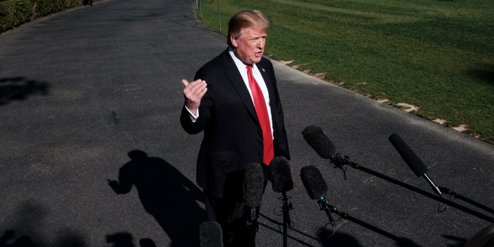 Then-President Donald Trump  talks to members of the media at the White House in 2019.